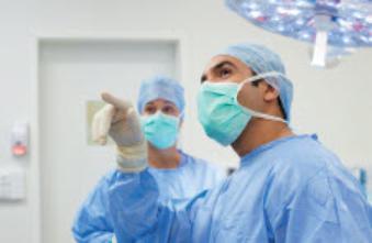 A picture containing room, scene, hospital room, person
Description automatically generated