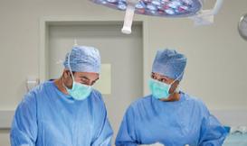 A picture containing person, hospital room, room, indoor
Description automatically generated