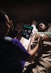 This photo shows someone working with the Philips Azurion image-guided therapy platform 