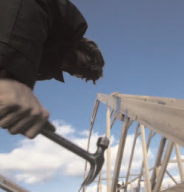 (PHOTO OF MAN WITH HAMMER)